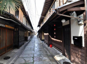 Отель Maeniiya Machiya Inn  Киото